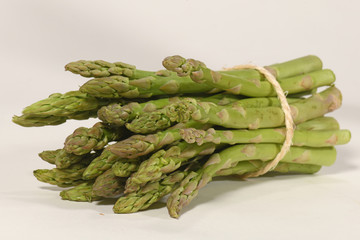 studio images of green asparagus