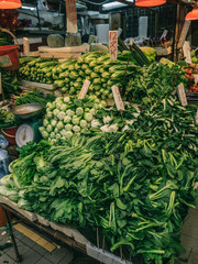 A selection of freshh chinese vegetables on display on a market stall in the Causeway Bay area of Hong Kong Island - 251801249