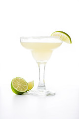 Margarita cocktail with lime in glass isolated on white background