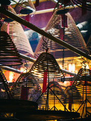 Circular incense coils in the Man Mo temple, Hong Kong Island - 251802409