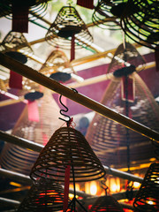 Circular incense coils in the Man Mo temple, Hong Kong Island - 251802424