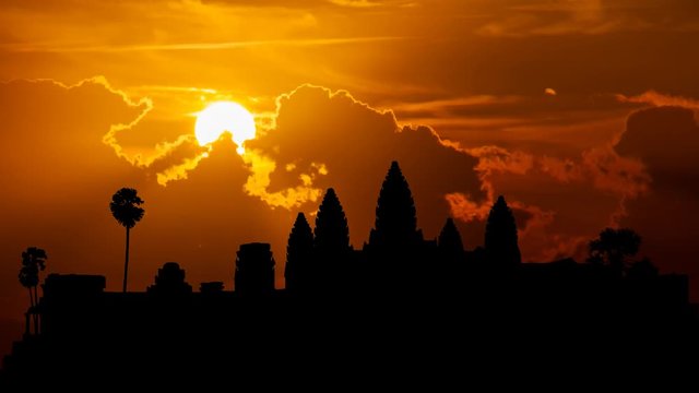 Angkor Wat at Sunset, is a Temple Complex in Cambodia and one of the Largest Religious Monuments in the World. Originally Constructed as a Hindu temple  it was gradually transformed into a Buddhist te