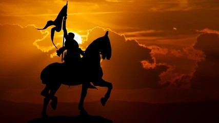 Joan of Arc or Jeanne d'Arc Bronze Equestrian Statue in Paris at Sunset; is considered a Heroine of France for her role during the Lancastrian phase of the Hundred Years' War, and was canonized as a R