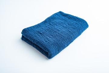 Folded blue washed linen fabric