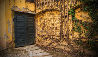 Fototapeta na wymiar An old wooden external double door in old Gornji Grad in Zagreb
