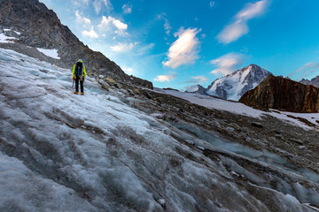 Mountaineer climbing glacier Mont Blanc mountains, France Alps.