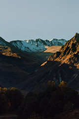 Obraz premium beautiful mountain and city landscape. light and shadow. the texture of the rocks