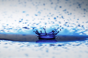 Blue drop on a white background - 251812460