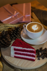 cup of coffee and cake on wooden table
