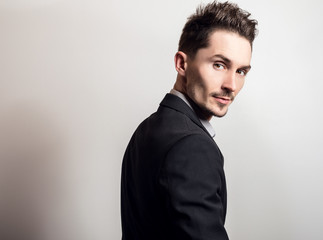Obraz premium Handsome young elegant man in costume.