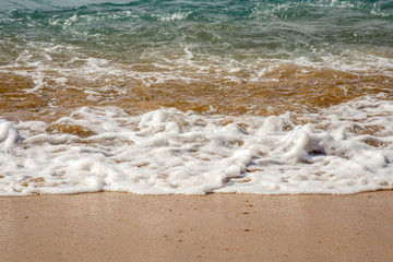 Beautiful ocean wave on sandy beach