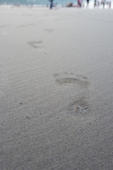 footprints on the beach