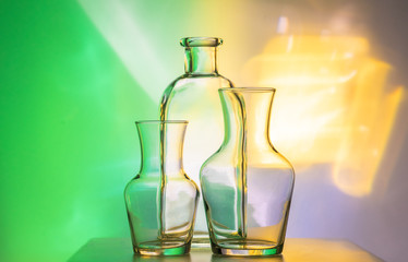 glass bottle glassware on color background green