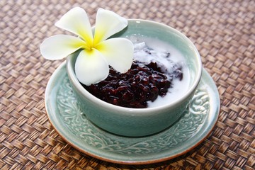 Black sticky rice pudding with coconut cream, Thai dessert