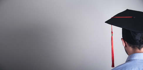 Man with graduation hat. Education