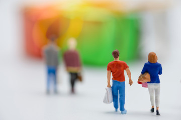 Miniature people buy goods or merchandise during grand sale and discount using as shopping business concept. - Image