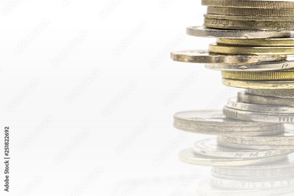 Poster closeup of gold and silver coins stacking in each different position on white background - image.
