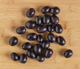 Black grapes on the table.