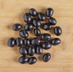 Black grapes on the table.