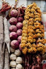 Georgia, Tbilisi, The central city market. Onion and garlic braids.