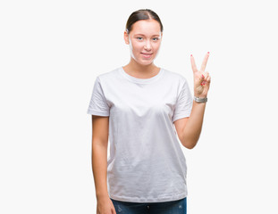 Young beautiful caucasian woman over isolated background showing and pointing up with fingers number two while smiling confident and happy.