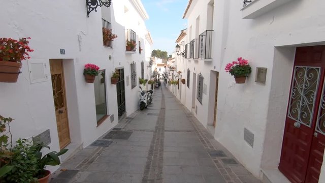 Panning view of street in Mijas Pueblo on Costa del Sol in Spain.