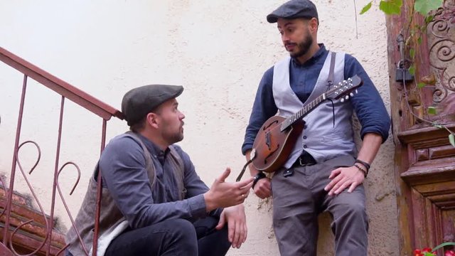 Two friends with mandolin, folk band 