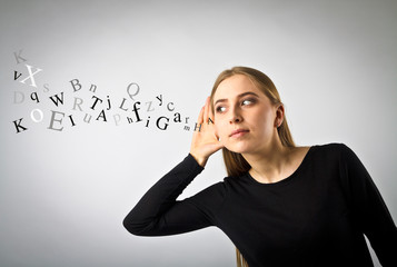 Curious woman in black and letters