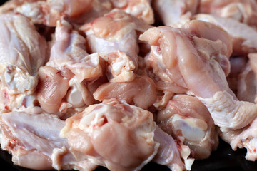 fresh raw sliced ​​chicken wings preparation for grilling