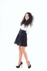 portrait of a modern young woman in a white blouse and black ski