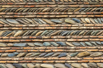 The picturesque wall made of natural stone