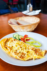 omelet with ham tomato and green salad