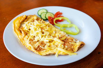 omelet with ham tomato and green salad