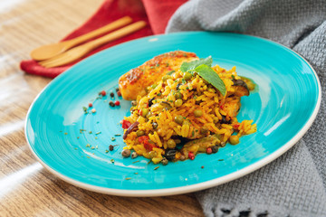 Andalusian fish, saffron rice with vegetables