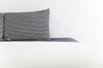 Closeup Modern style bedroom with pillows on bed