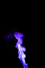 Fototapeta premium Dual colour vape steam column with spray boiling liquid. Blue and purple colour smoke. Stock photo isolated on black background.