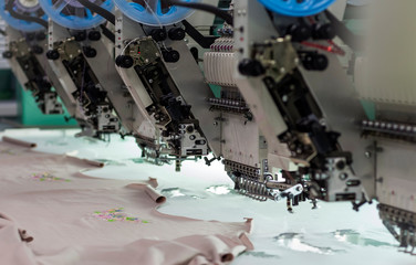 embroidery on the details of the cut lying on the embroidery machine
