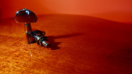 guitar tuning pegs . color background