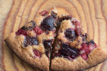 Homemade cake lie on wooden desk
