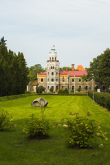 Front view of Sigulda New Castle / Siguldas jaunā pils with walking path during autumn (Riga area,...