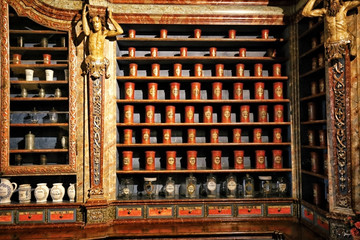 Old pharmacy cabinet with plenty of boxes