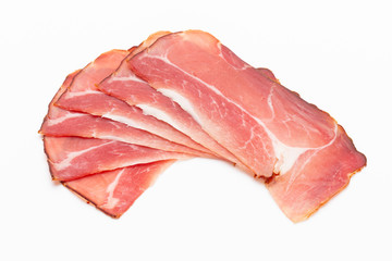 Hamon sliced on white background. Spanisch traditional meat.