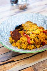 Paella with chicken, seafood and chorizo