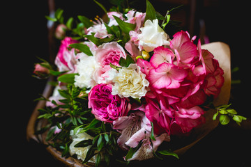 Luxurious bouquet of natural flowers in an elegant chair