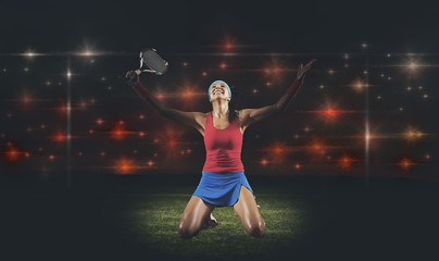 Fototapeta na wymiar Female tennis player celebrating winner