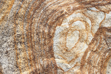 The striped texture of the natural sandstone