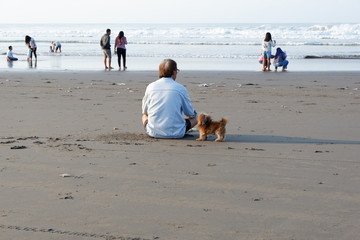 someone who is praying on the beach