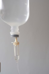 Close photos of saline bottles in the hospital on a white background