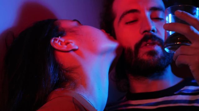 passionate couple kissing in a night club.Sensuality, sex, attraction