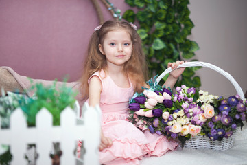 happy womens day for my mom, little girl holds flowers tulip